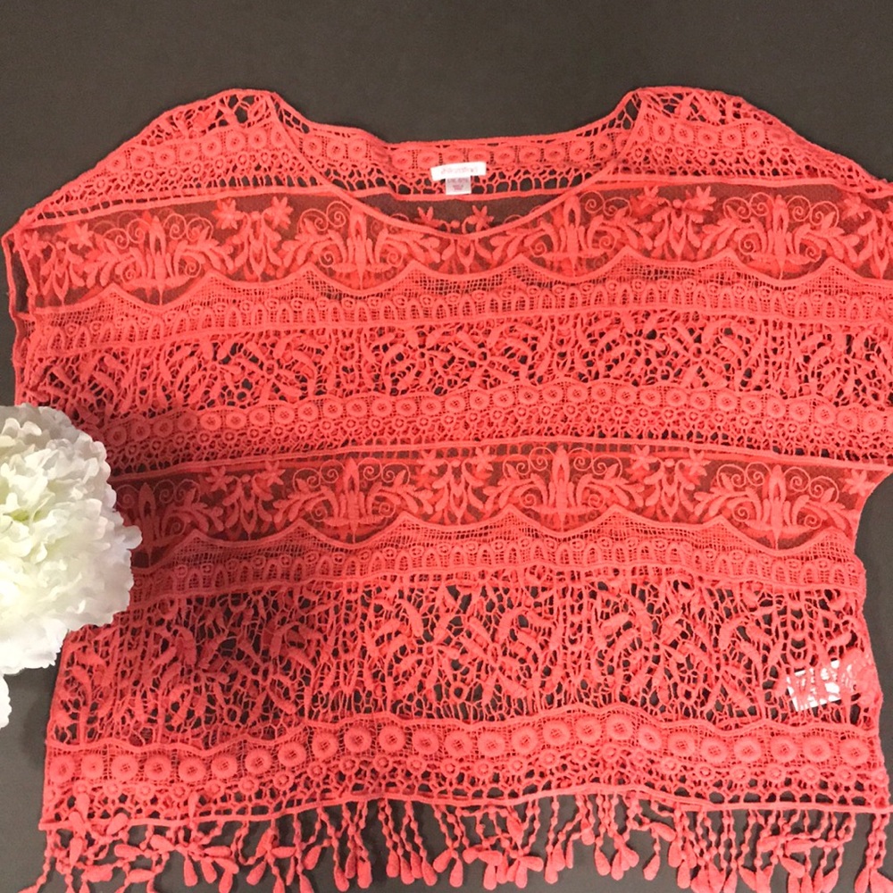 Lovely top to be worn over camisole or tank top.